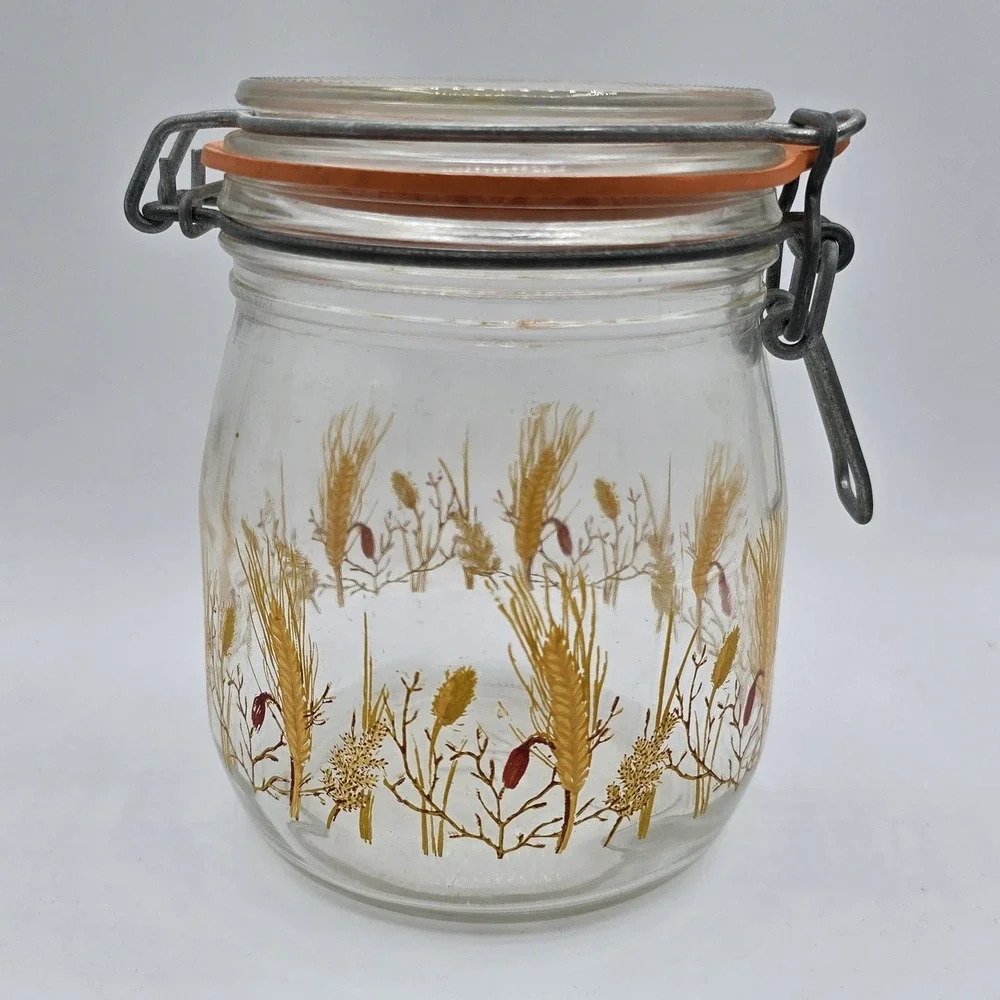 Vintage glass canister with wheat design Lid is stamped arc France